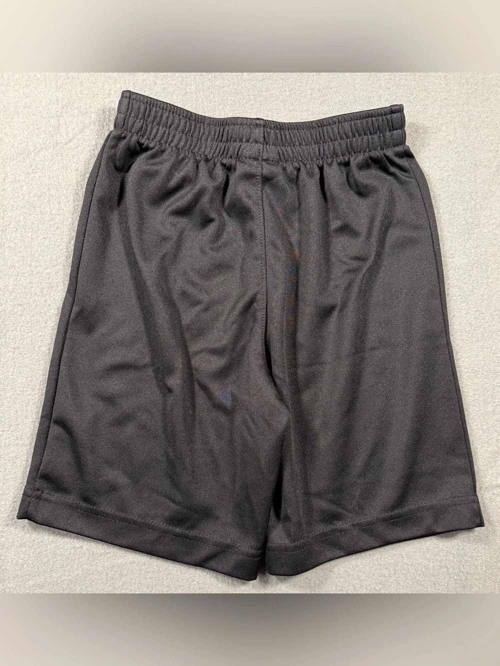 Nike Black Youth Athletic Shorts with Red Logo